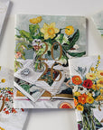 Decorative calendar with floral and vintage design on a white surface