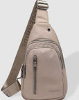 Boyd nylon sling bag in Beige by Louenhide