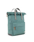 Teal backpack with gray straps on a white background