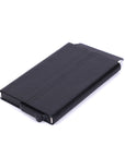 Black metal business card holder on a white background