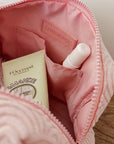 Pink bag with L'Occitane product inside