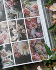 Floral photo album with images of flowers surrounded by greenery