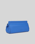 Blue handbag on a light gray background