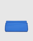 Blue clutch bag on a light gray background