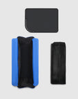 Black and blue pouches on a light gray background