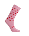 Pink sock with red polka dots on a light gray background