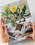 Notebook with floral design and '20' on a white background