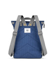 Blue backpack with gray straps on a white background