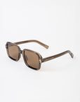 Sunglasses with brown gradient lenses on a white background
