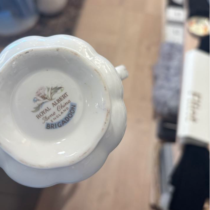 Close-up of a Royal Albert bone china mug with blurred background