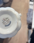 Close-up of a Royal Albert bone china mug with blurred background