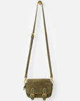 An olive green crossbody satchel bag with a long shoulder strap and gold-tone hardware, shown against a light gray background.