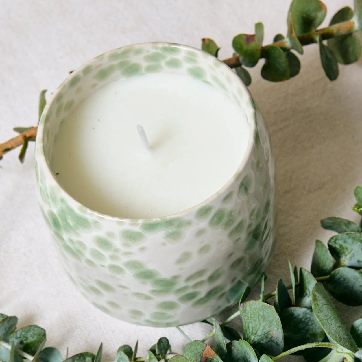 Green splash glazed candle
