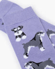 Purple socks with dog pattern on a white background