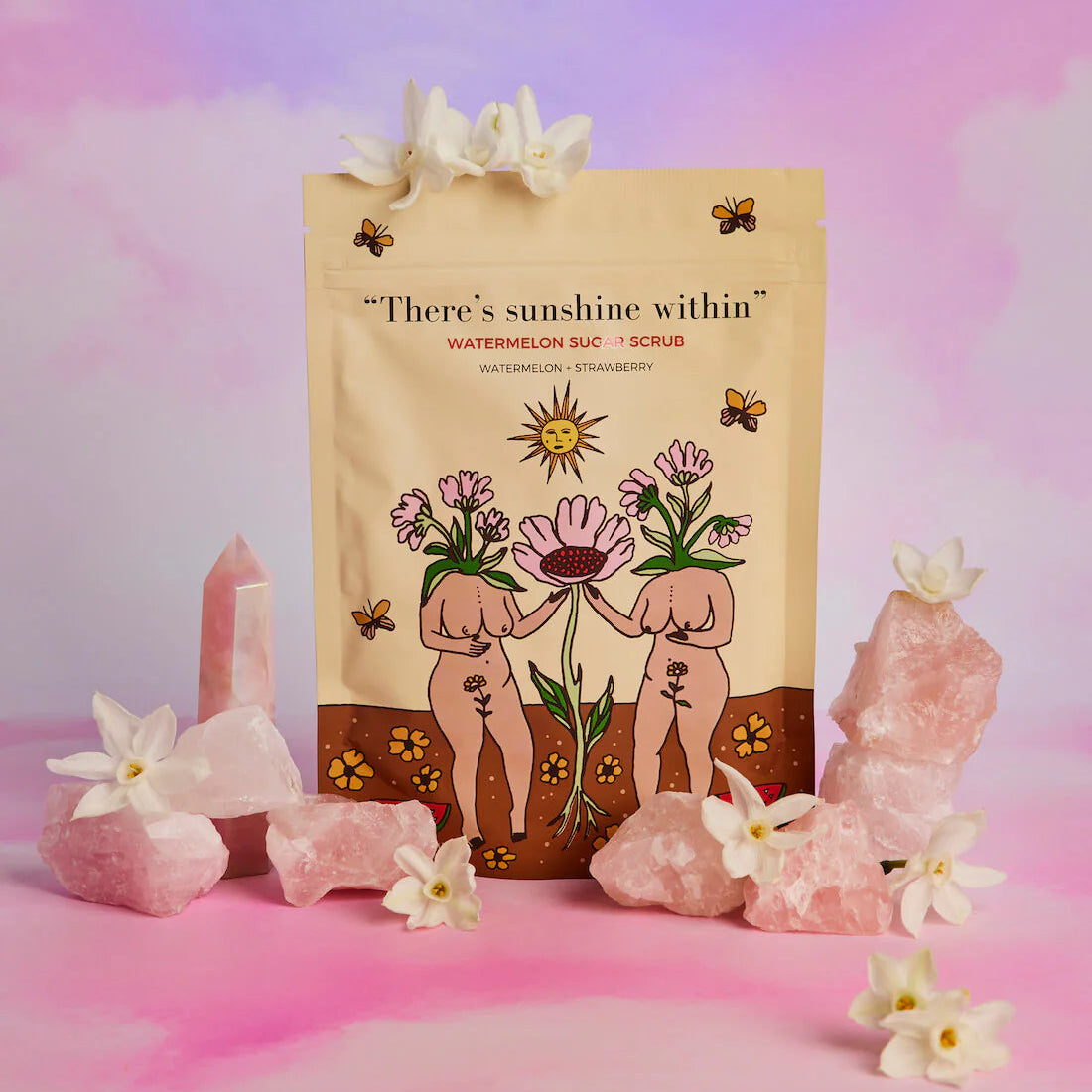 Product packaging with floral design and text on a pastel gradient background