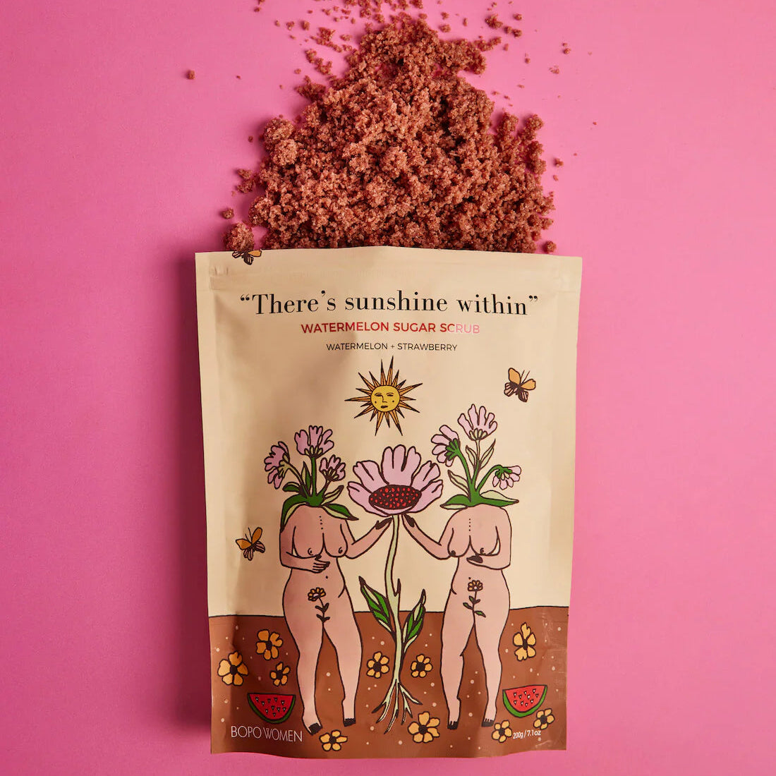 Product packaging with illustrations and text on a pink background