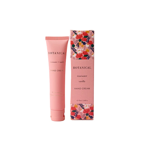 Botanical hand cream with floral packaging on a pink background
