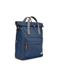 Blue backpack with gray straps on a white background