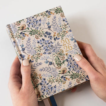 Floral-patterned notebook with '2026' on a white background
