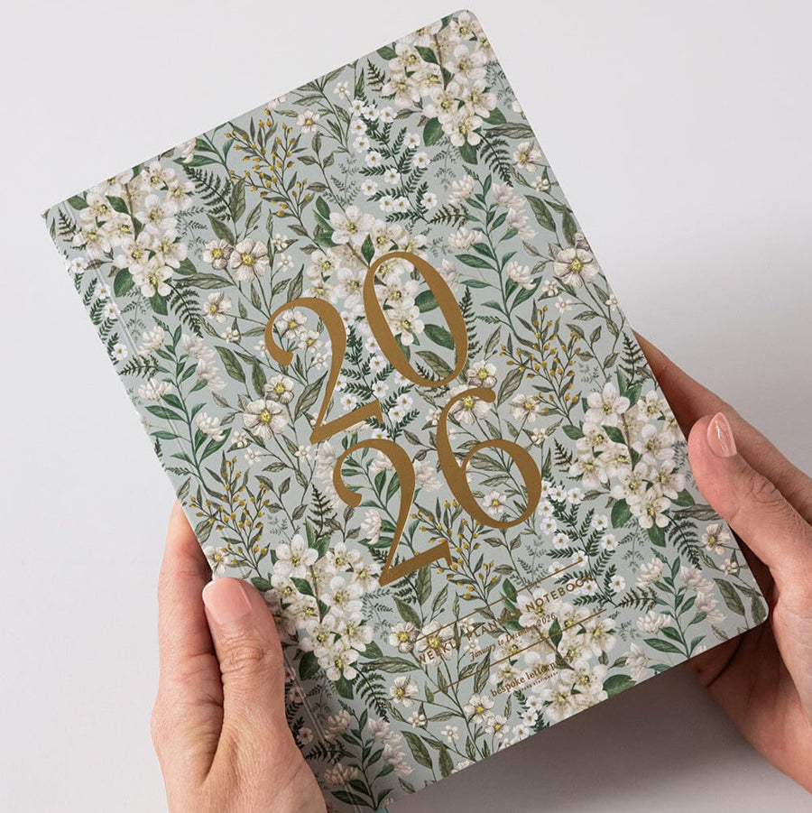 Floral notebook with '2026' on a light background