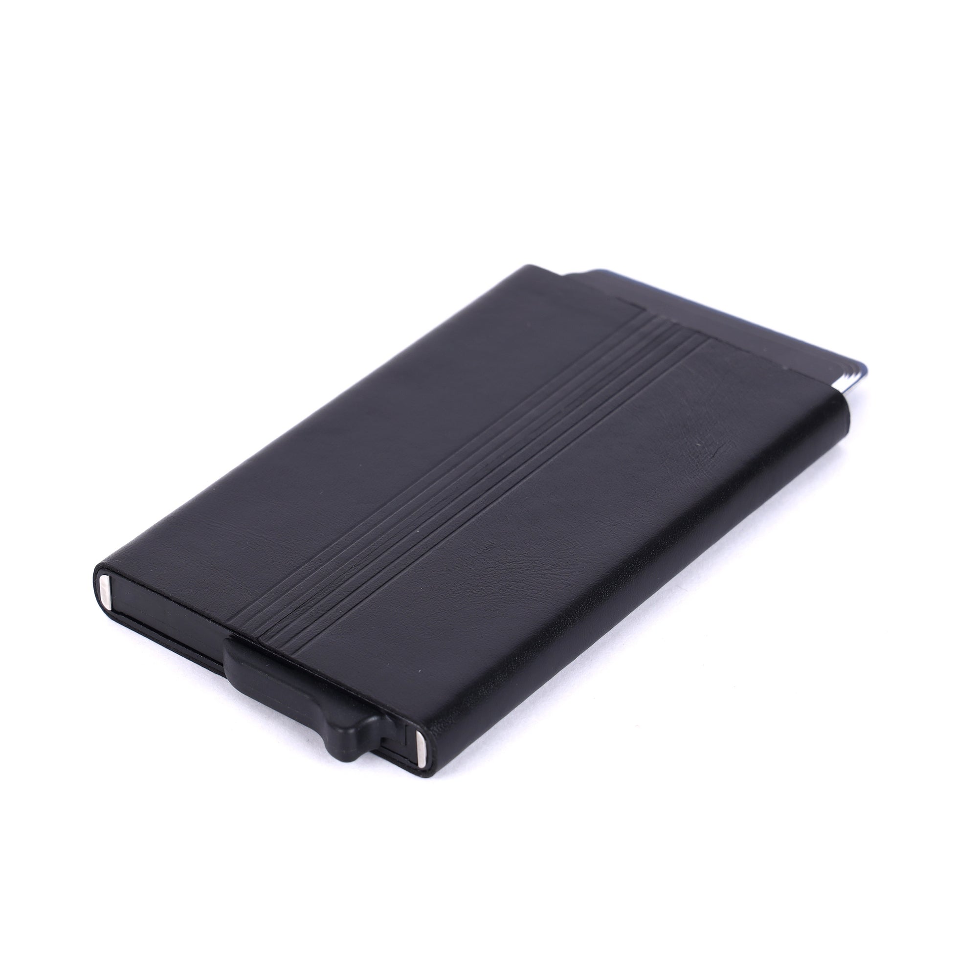 Black metal business card holder on a white background