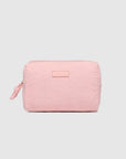 Pink textured pouch on a light gray background