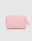 Pink textured pouch on a light gray background