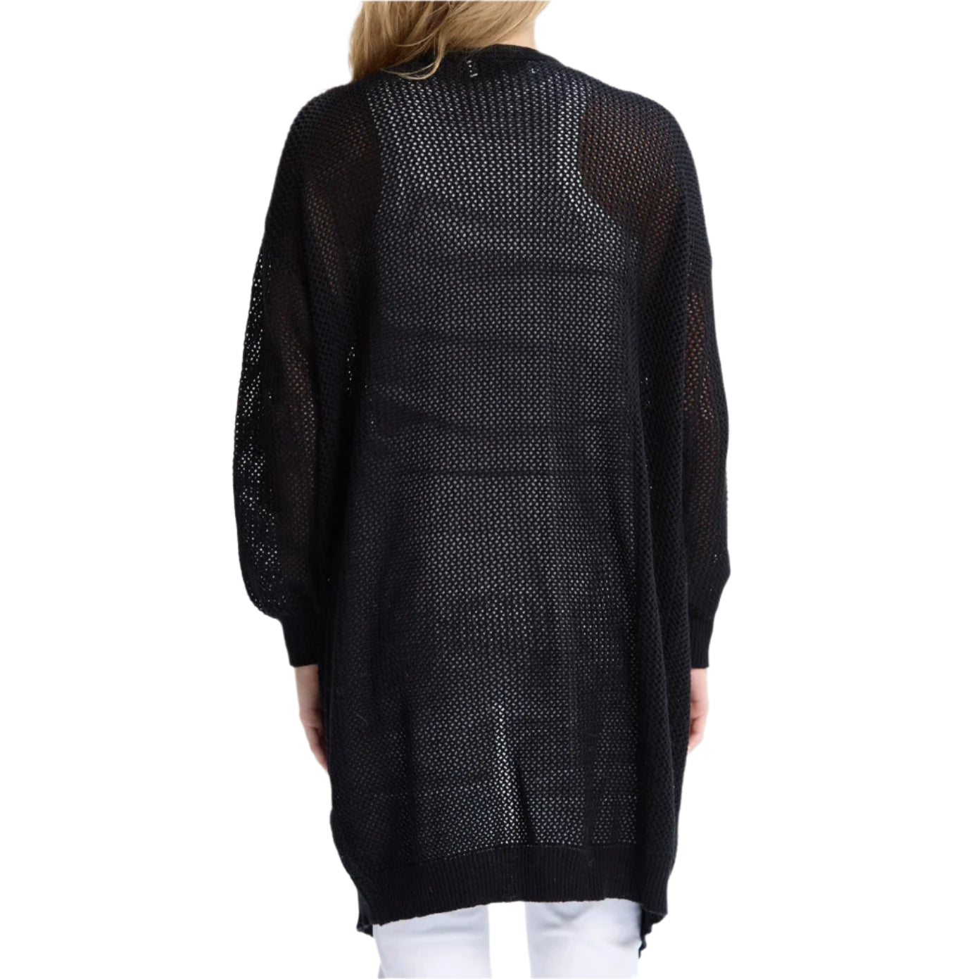 Person wearing a black mesh dress with a white background