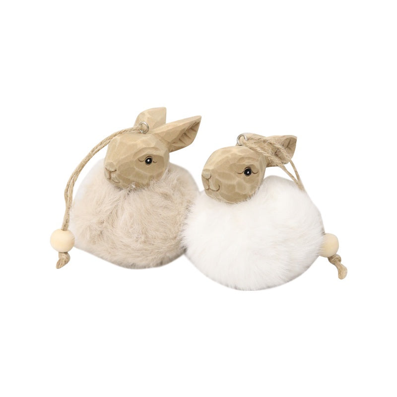 Cute hanging carved wooden/fluffy bunnies by Le Forge