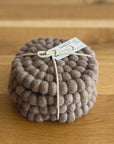 Brown textured ball with a tag on a white background