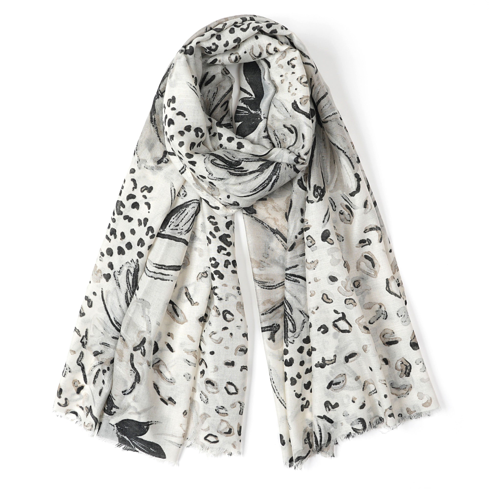White scarf with black animal print pattern on a white background