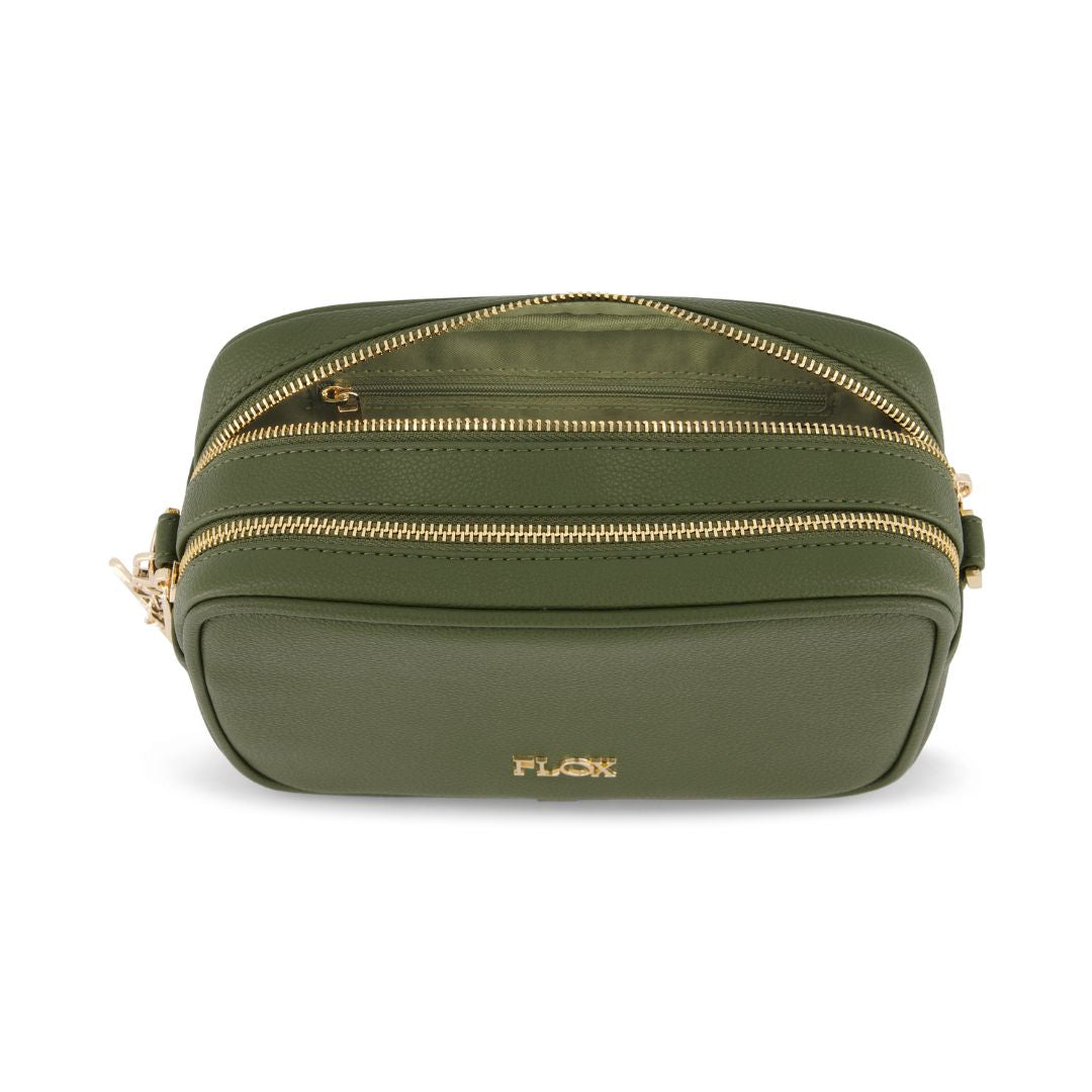 Green bag with gold zipper on a white background