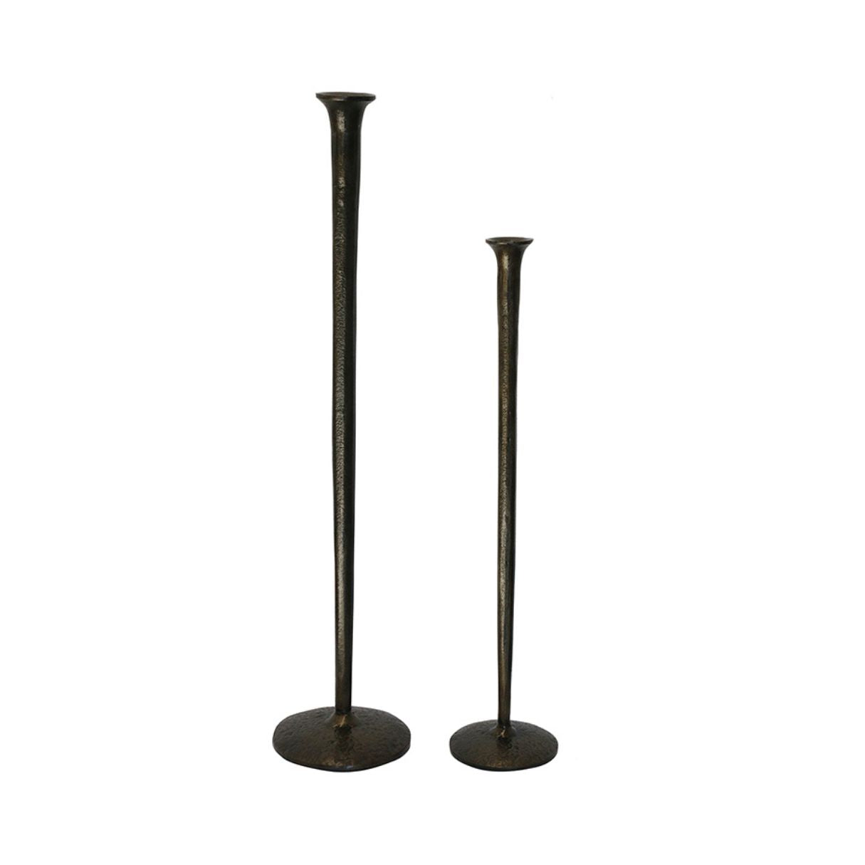 Two dark metal candlestick holders or candlesticks with round bases, one tall and one short, shown on a plain white background.