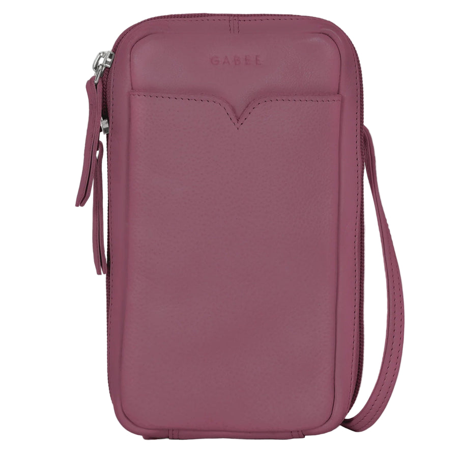 Pink crossbody bag with a strap on a light gray background