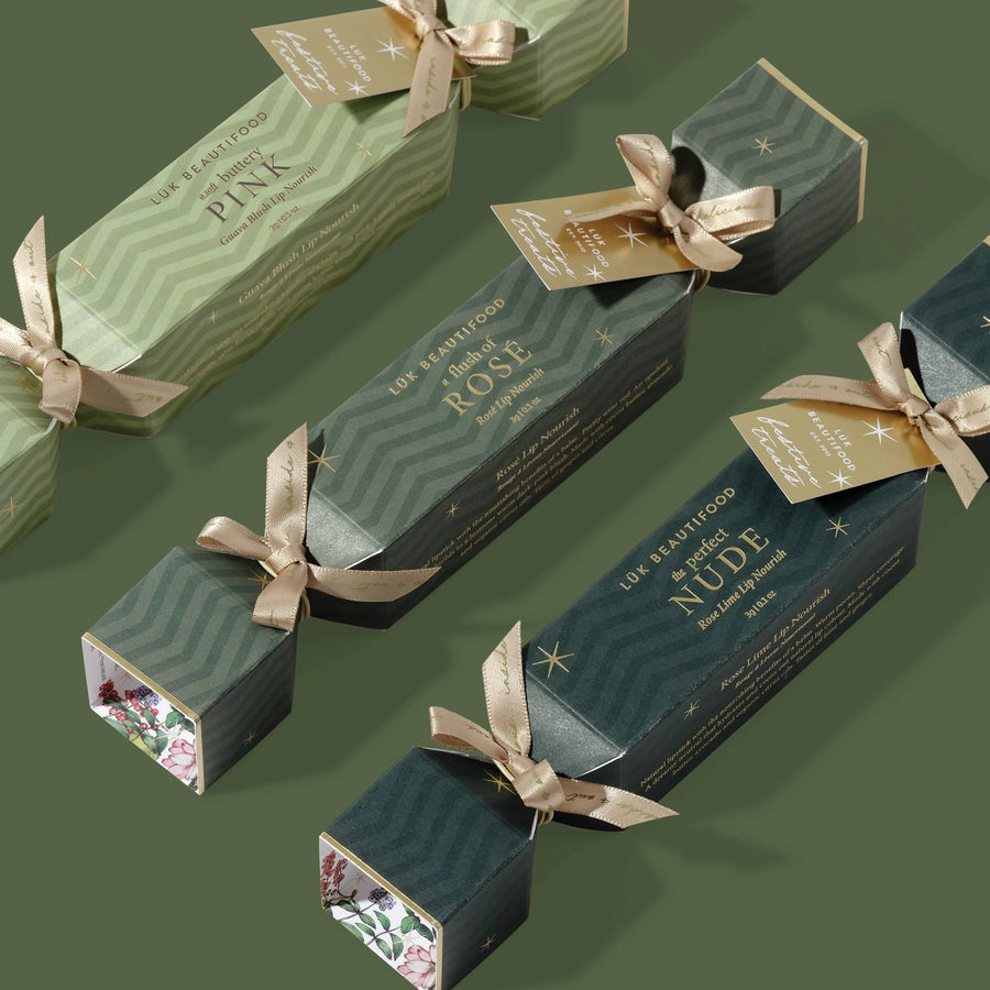 Green boxes with ribbons on a green background