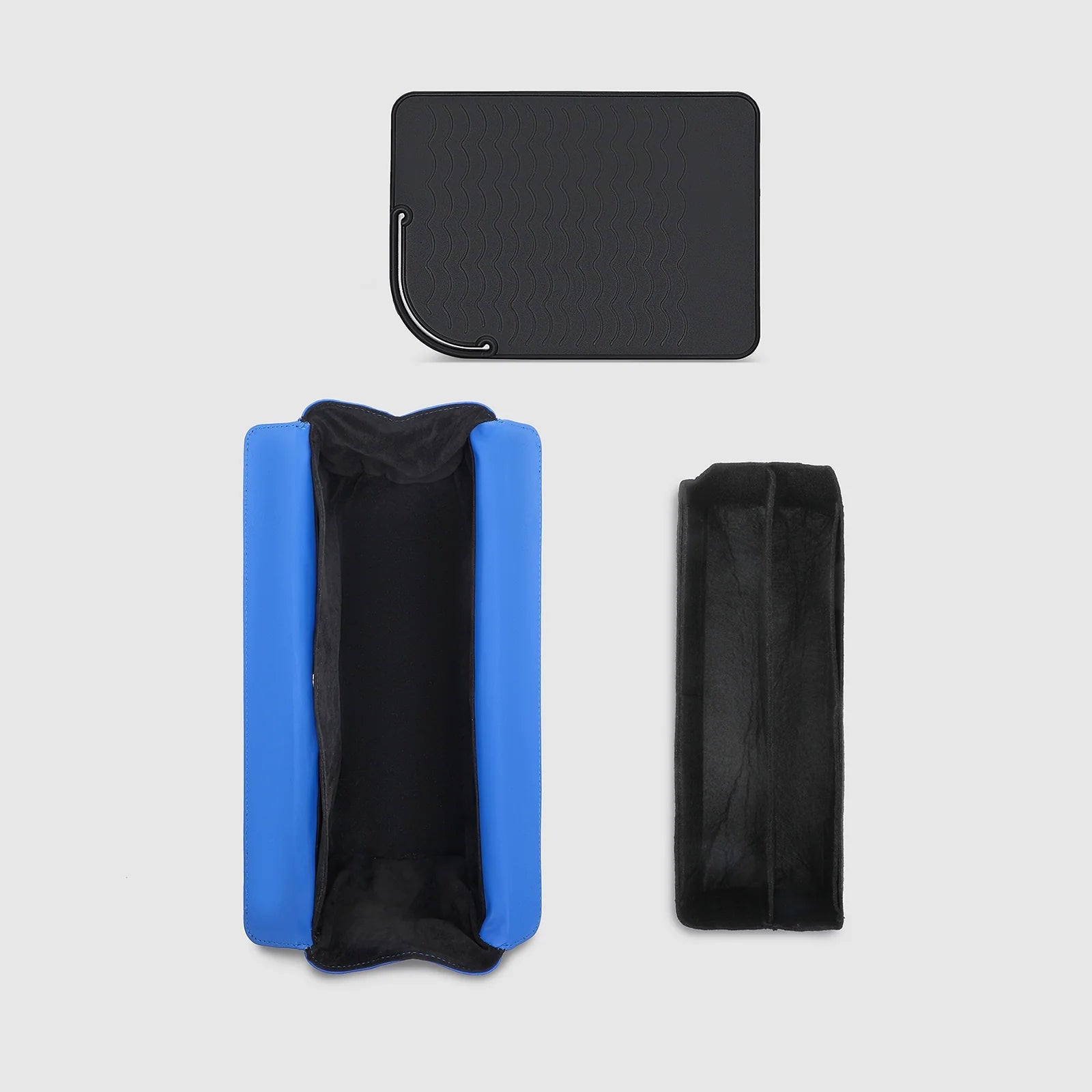 Black and blue pouches on a light gray background