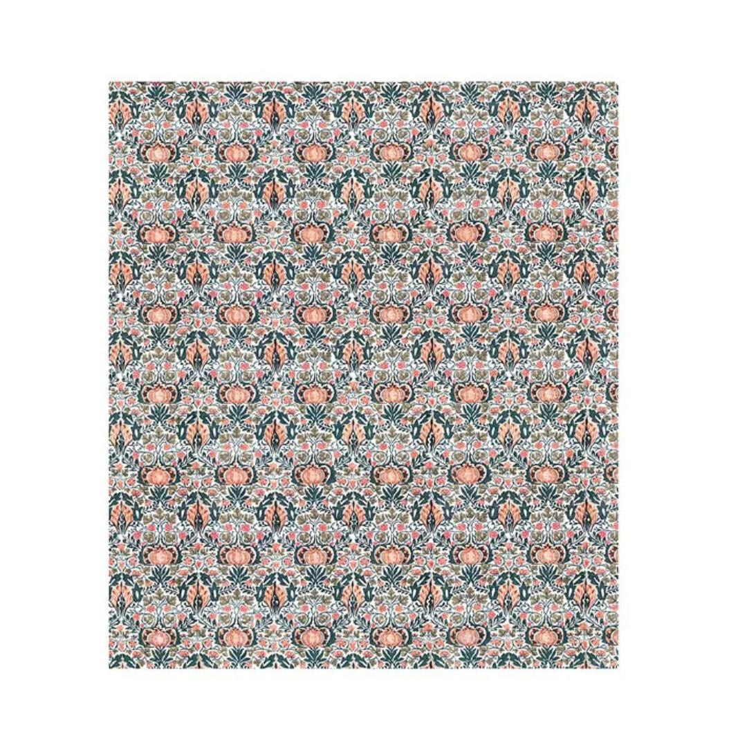 Patterned fabric swatch with floral design on a white background