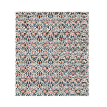 Patterned fabric swatch with floral design on a white background