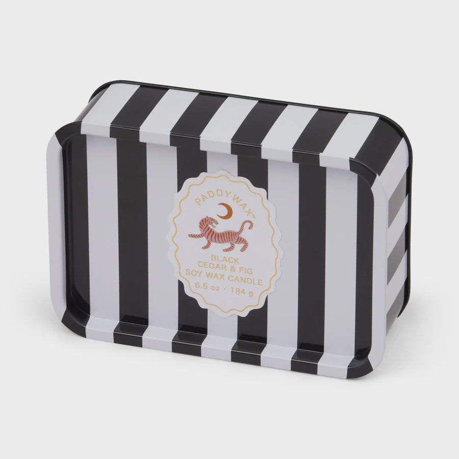 Black and white striped candle box with a tiger logo on a white background