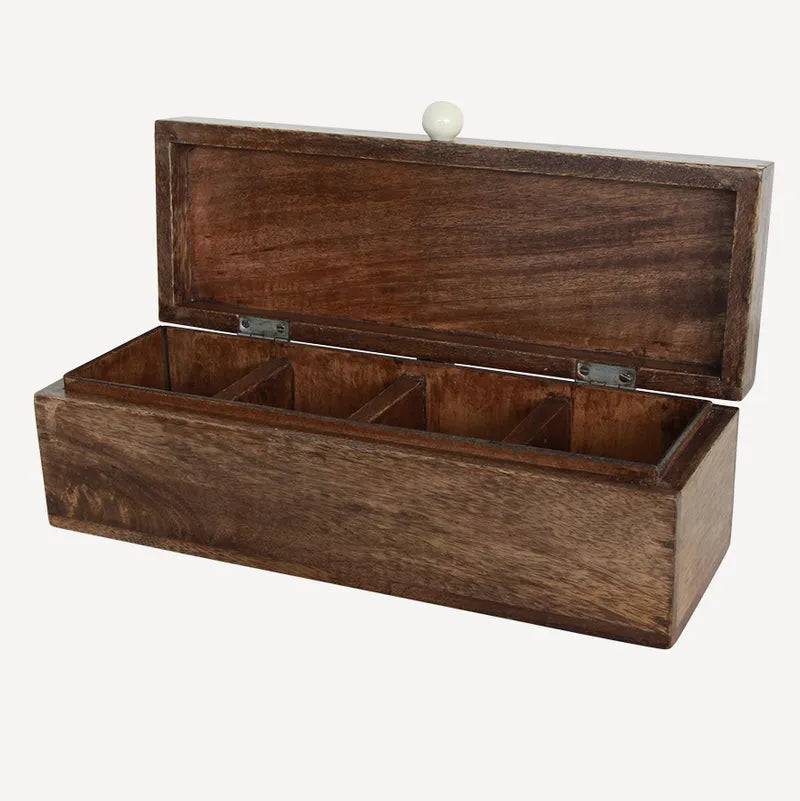 Wooden jewelry box with a lid open on a white background