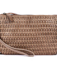 Woven beige handbag with a strap on a white background