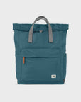 Teal backpack with gray straps on a light gray background
