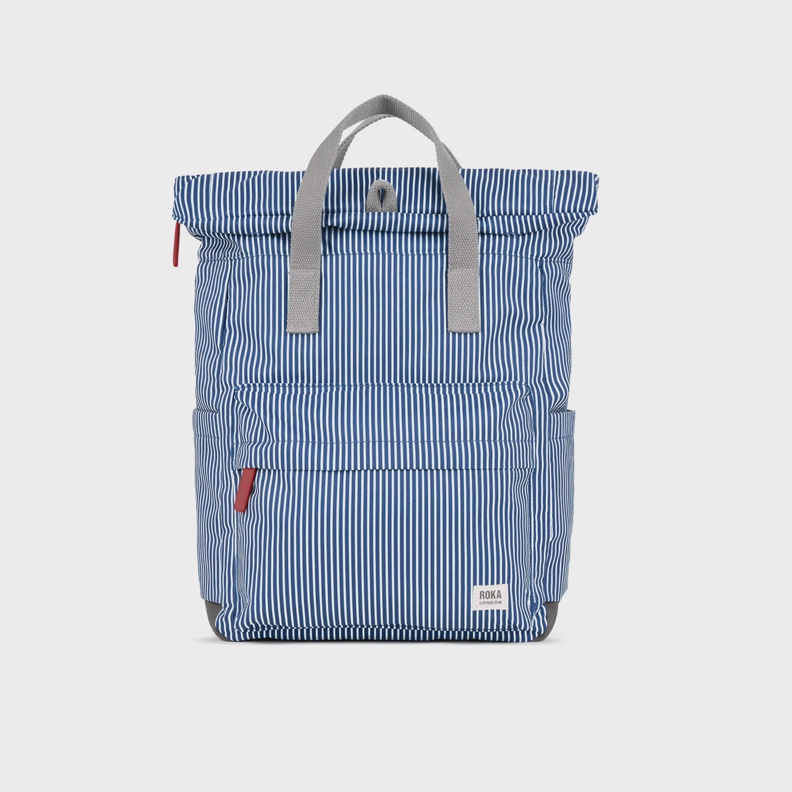 Blue striped backpack with gray handle on a light gray background