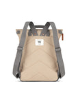 Beige backpack with gray straps on a white background
