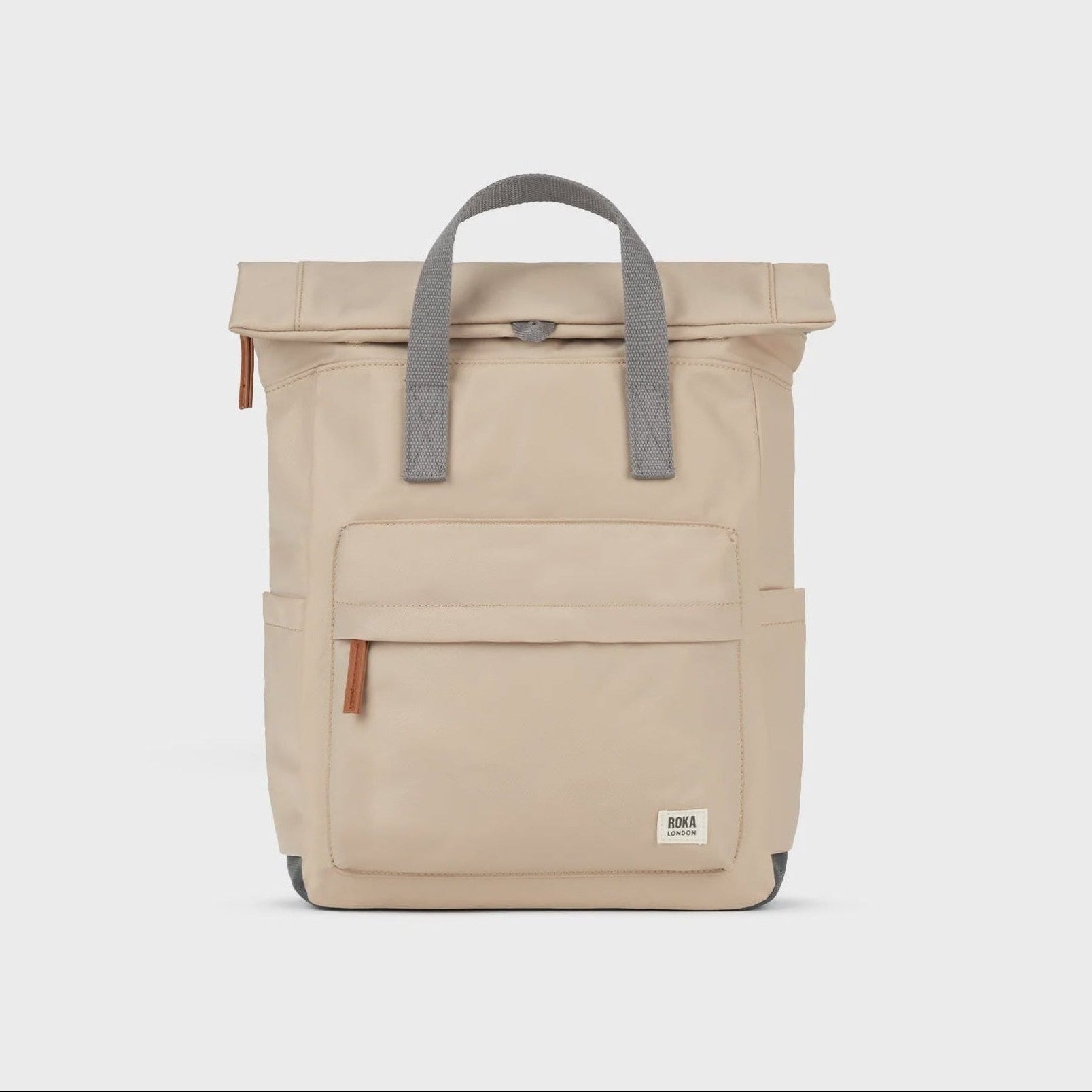 Beige backpack with gray straps on a white background