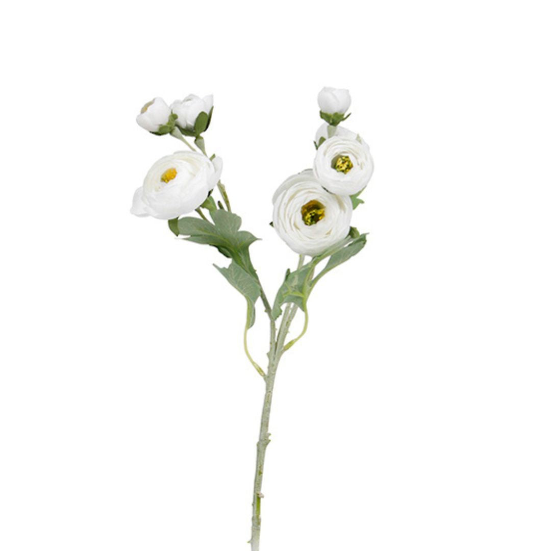 Artificial flower branch with white flowers on a white background