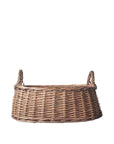 Wicker basket with handles on a light gray background