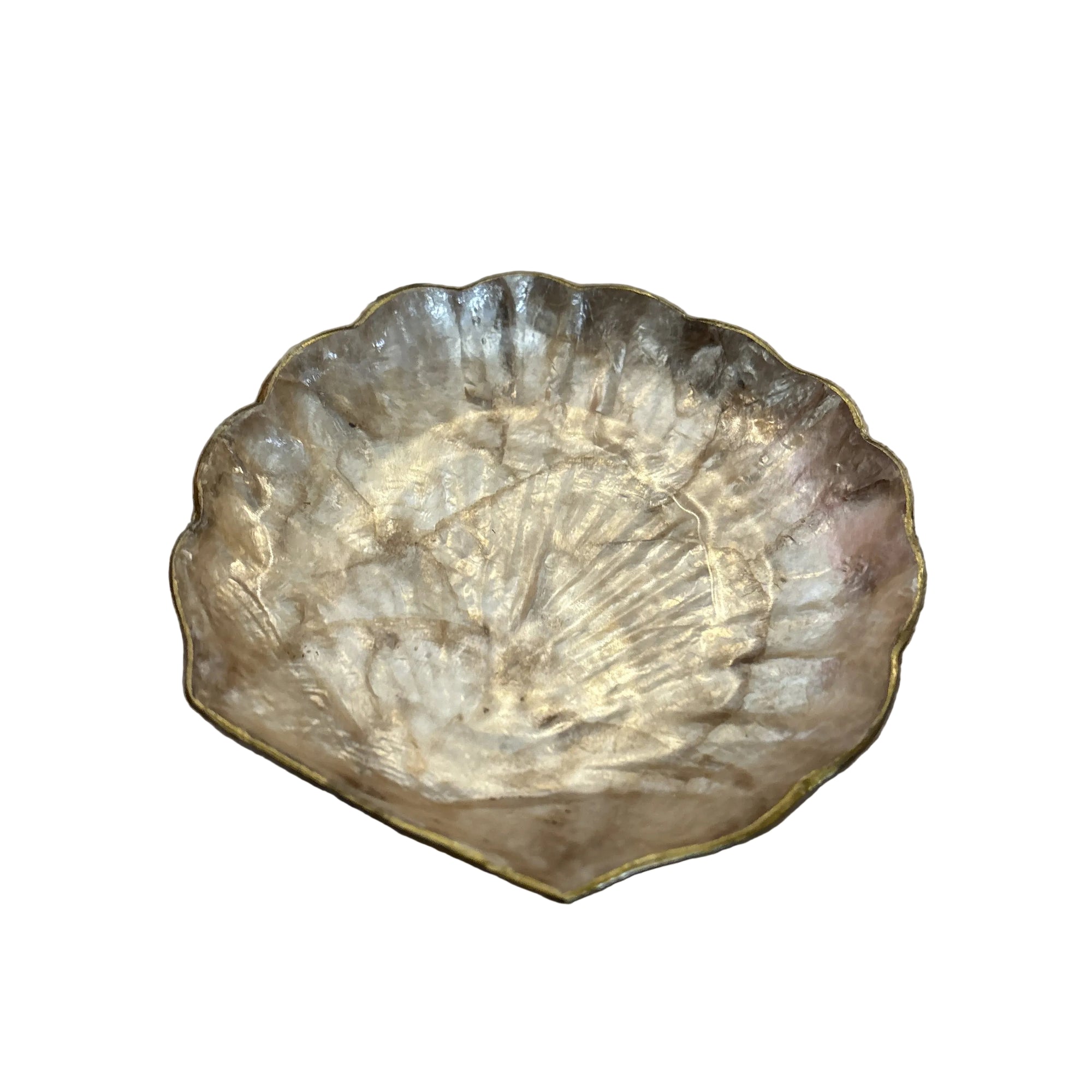 Decorative gold shell on a wooden floor