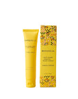 Botanical hand cream with packaging on a yellow background