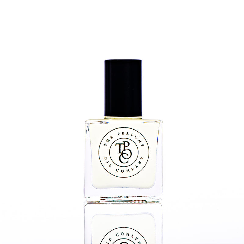 Perfume bottle with black cap and clear label on a white background